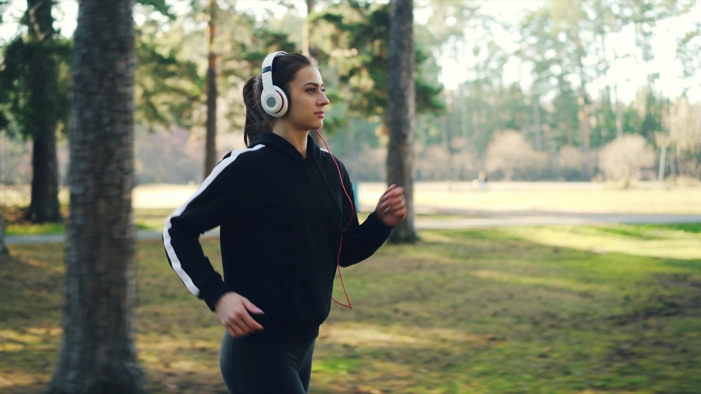 A woman jogging in a park
